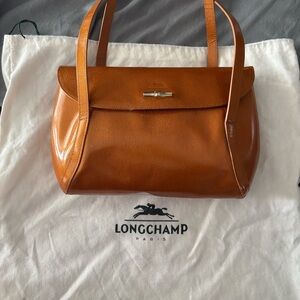 Vintage Longchamp Women's metallic bronze patent Leather Shoulder Bag.